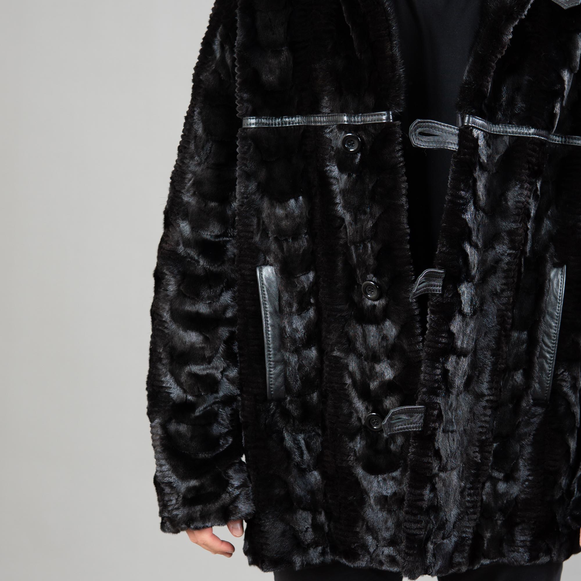 Mink fur jacket with leather details in black color