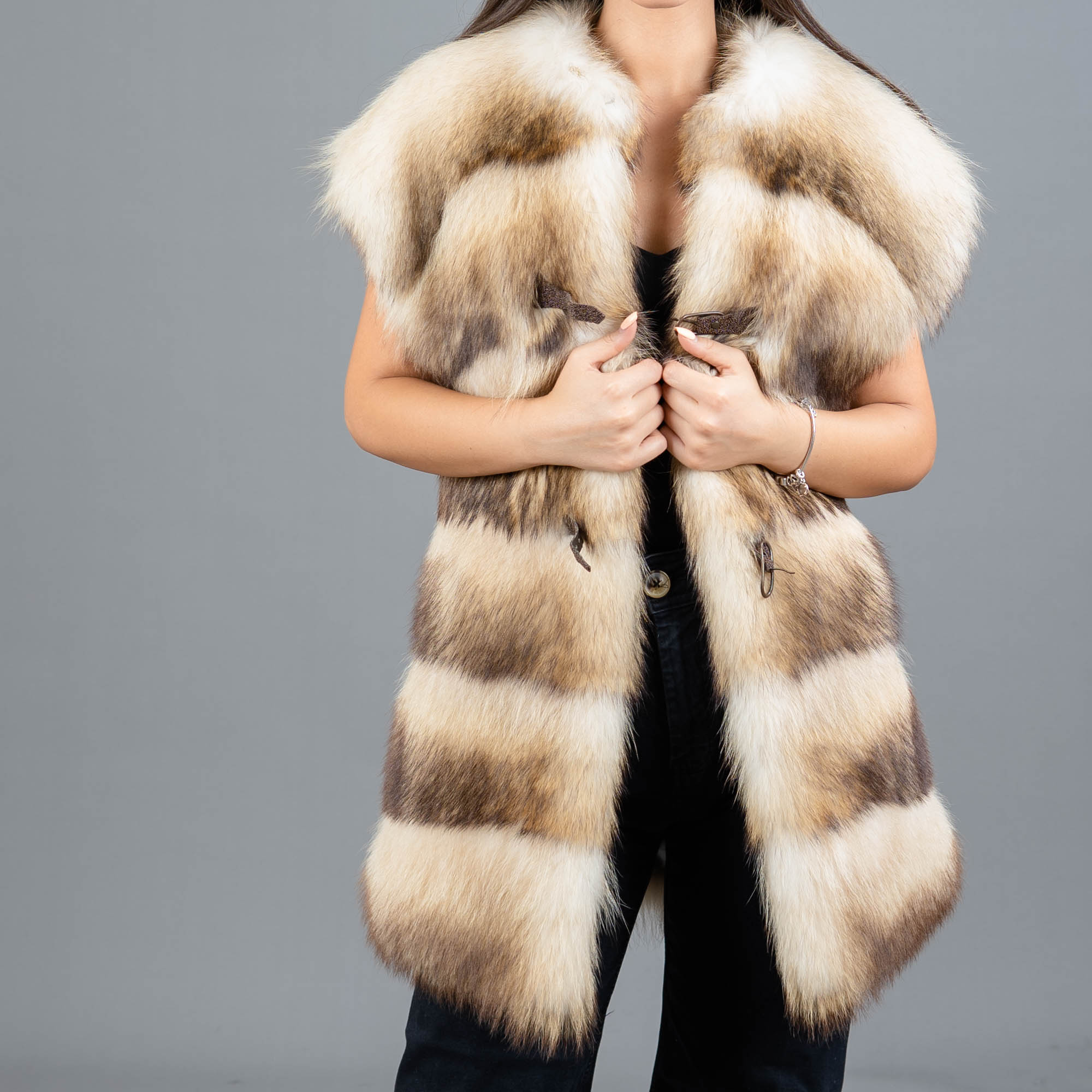 beige raccoon fur vest