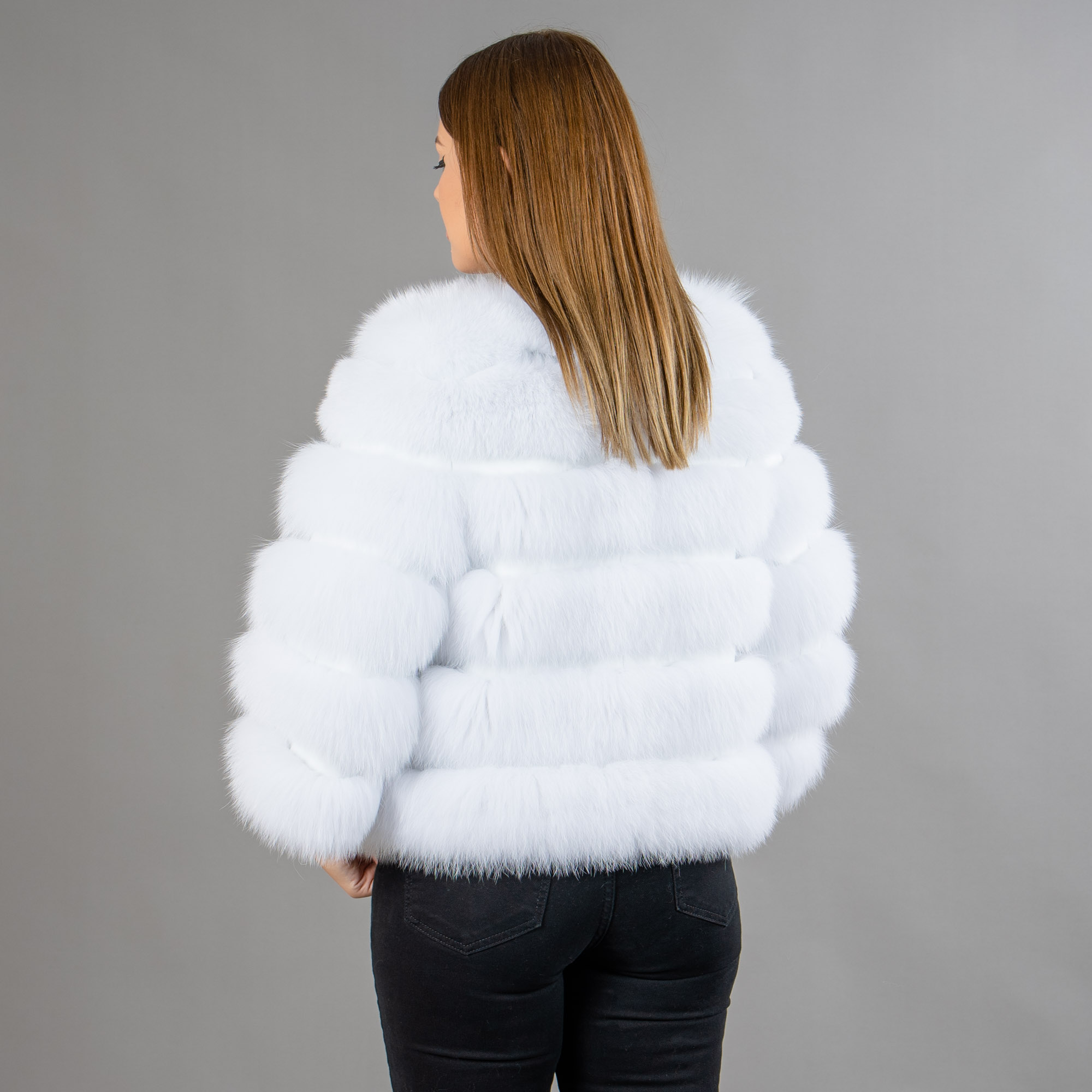 White fox fur jacket with leather details. 
