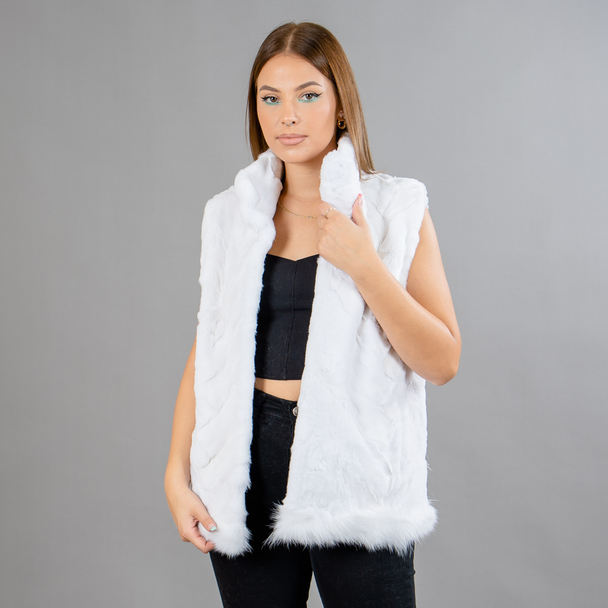 White fox fur vest with a collar. 