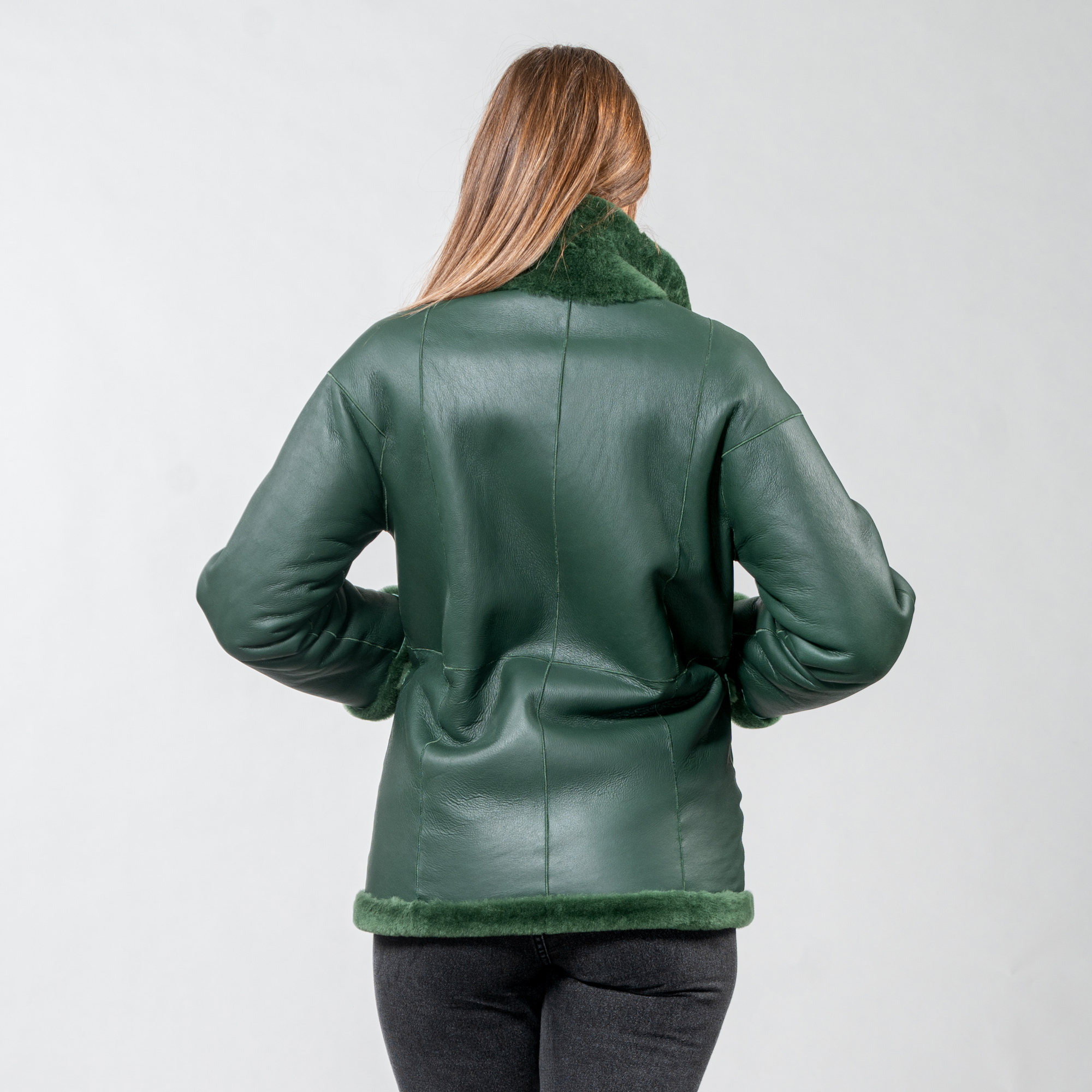 Reversible sheepskin jacket in green color