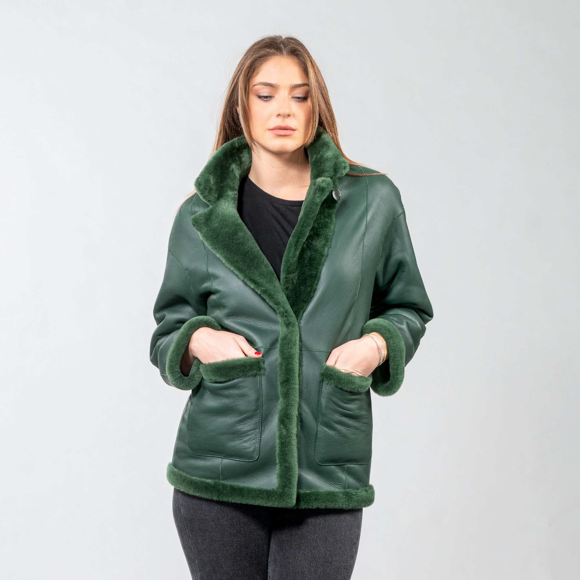 Reversible sheepskin jacket in green color