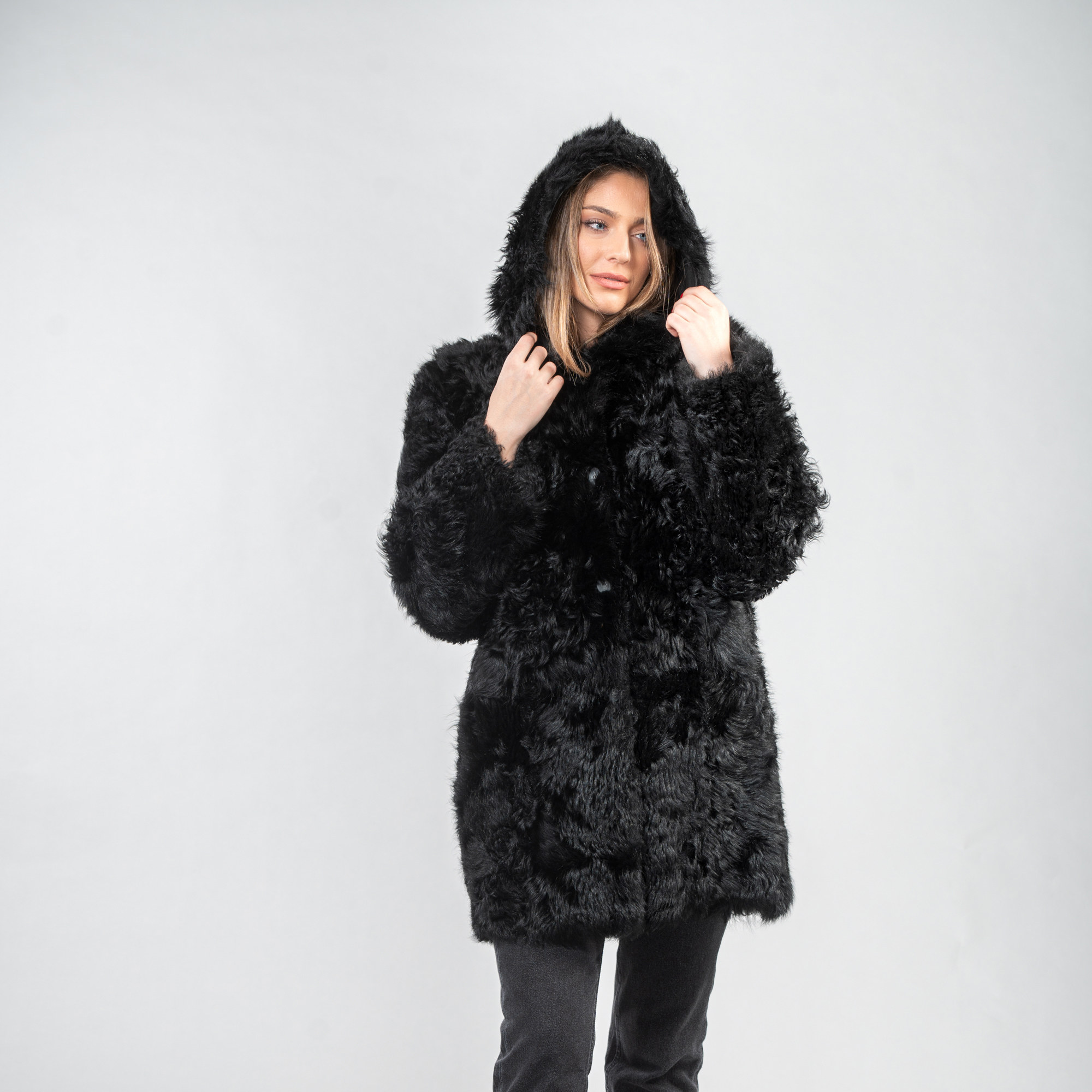 Black reversible sheepskin coat with a hood