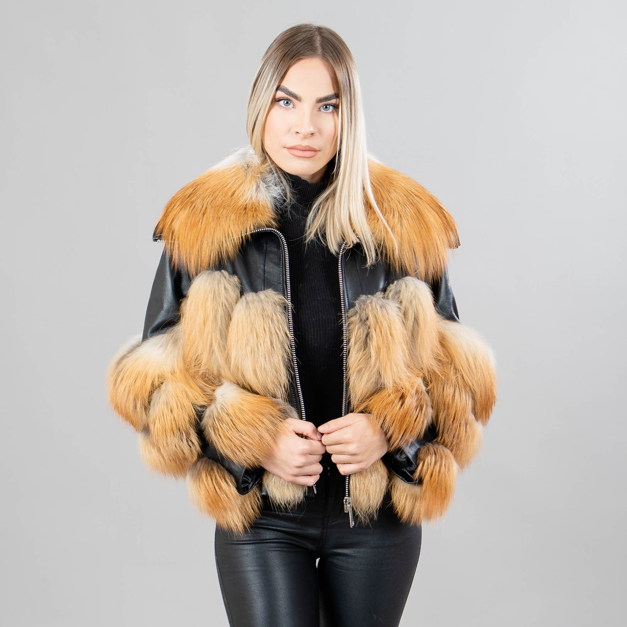 Leather jacket with golden fox fur