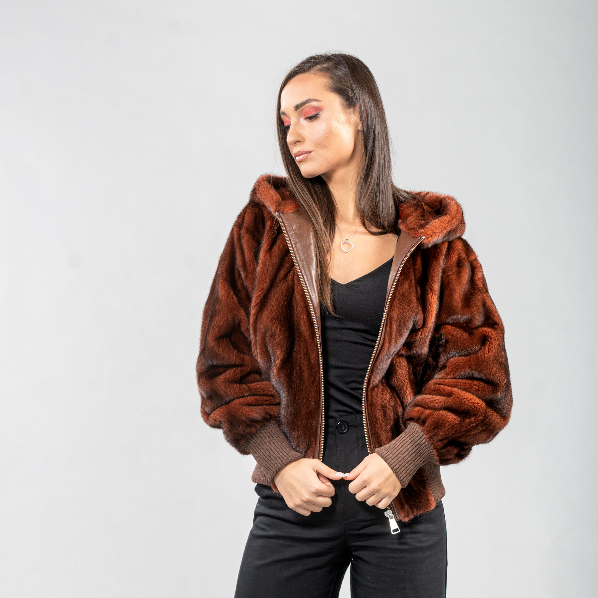 Mink fur jacket with a hood in brown color