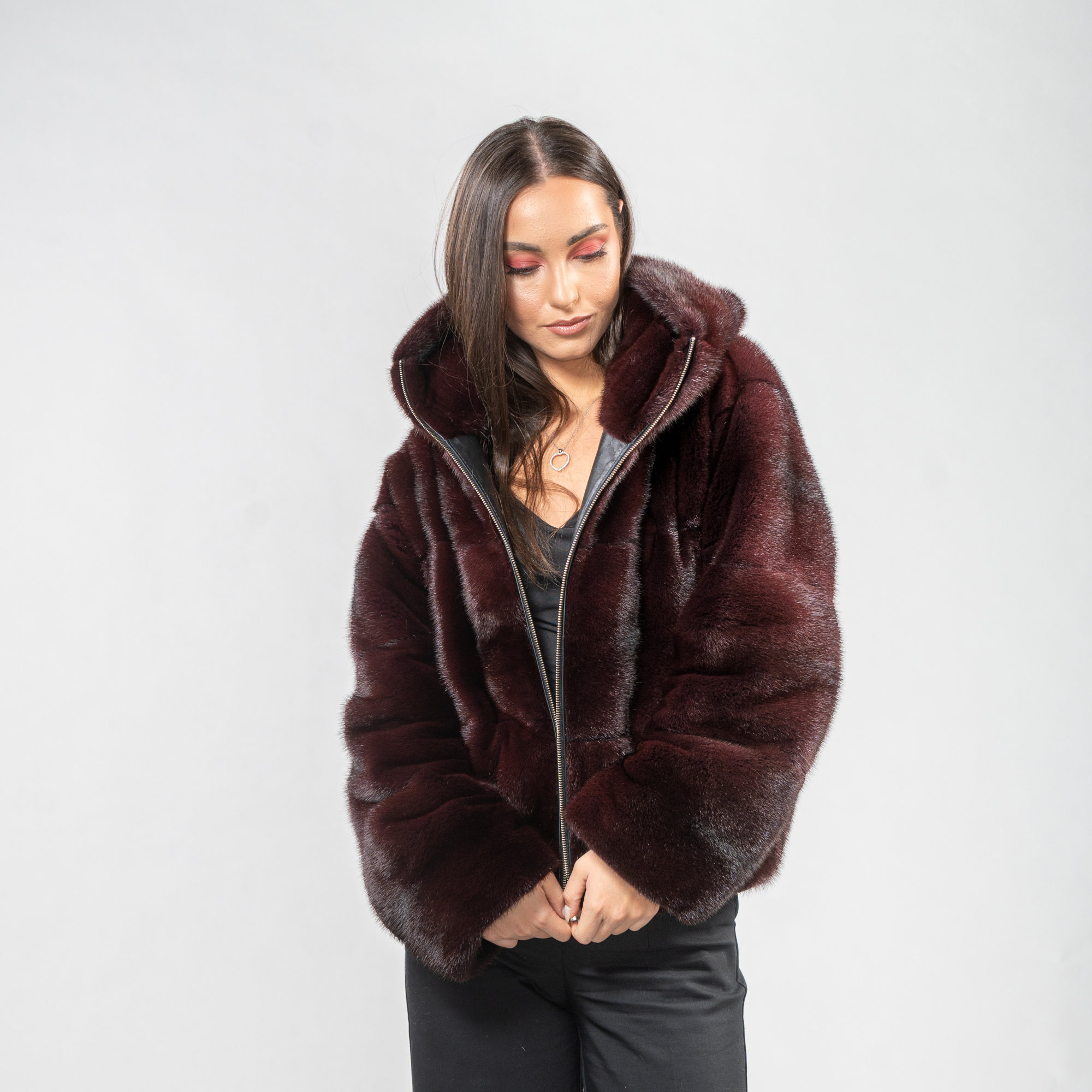 Mink fur jacket with a hood in burgundy color