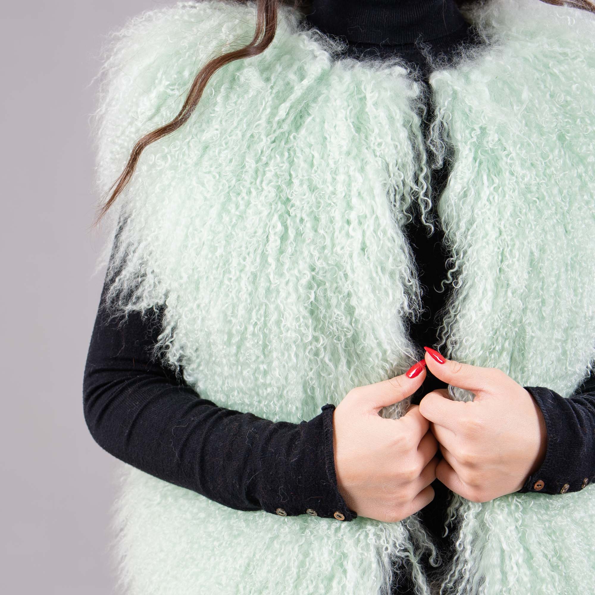 Mongolian sheep fur vest in green color