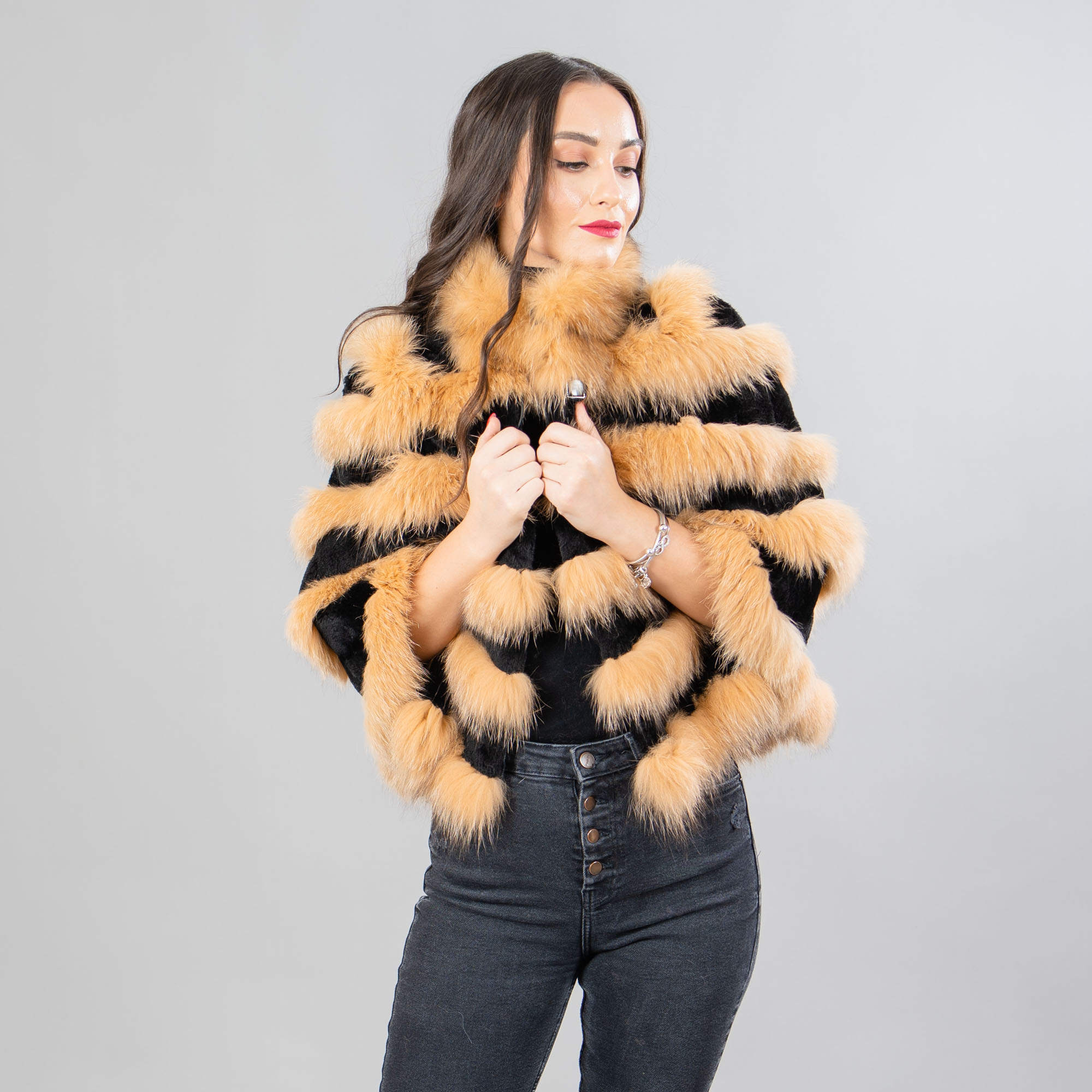 Fox fur cape with rabbit fur details in gold and black color