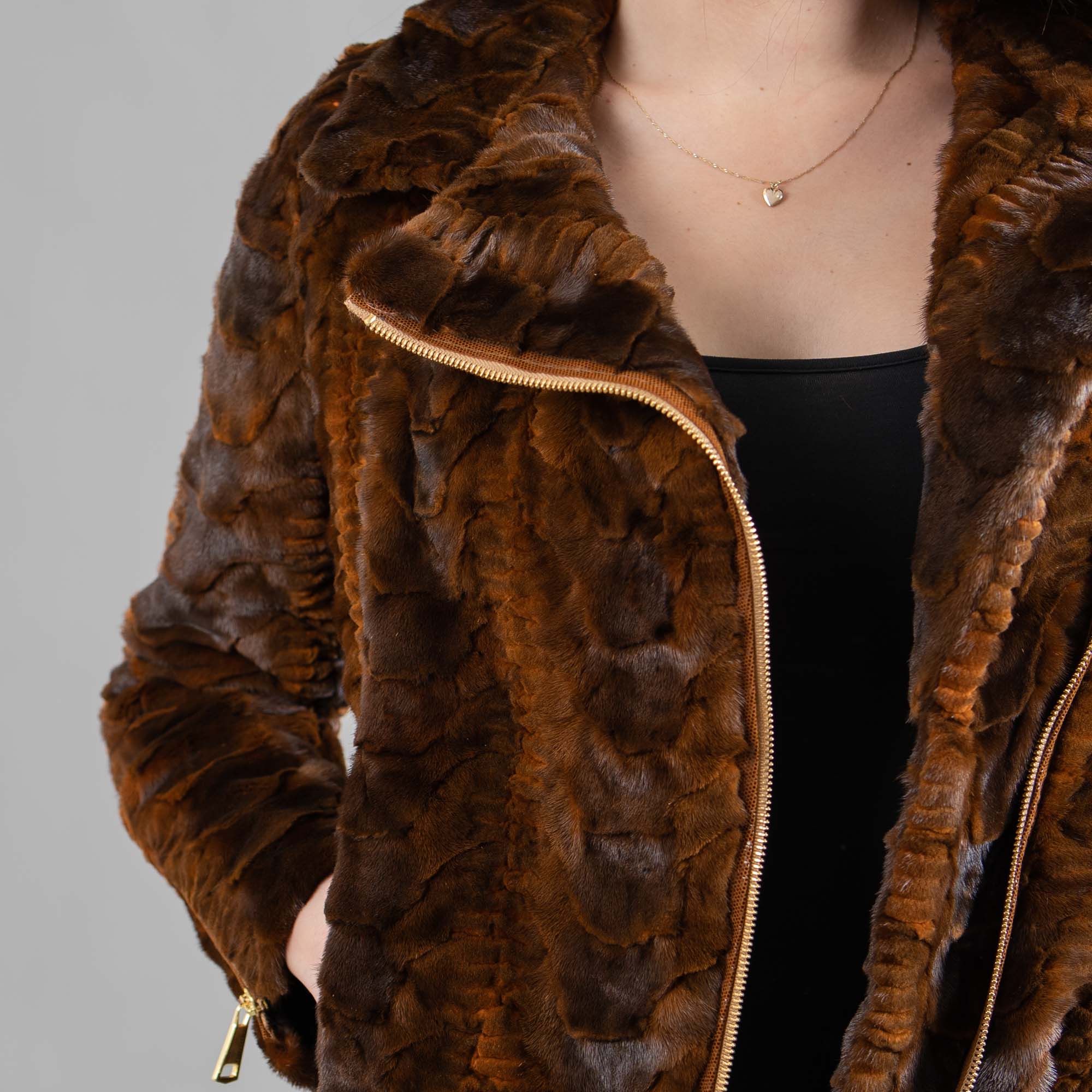 Mink fur jacket in brown color. 