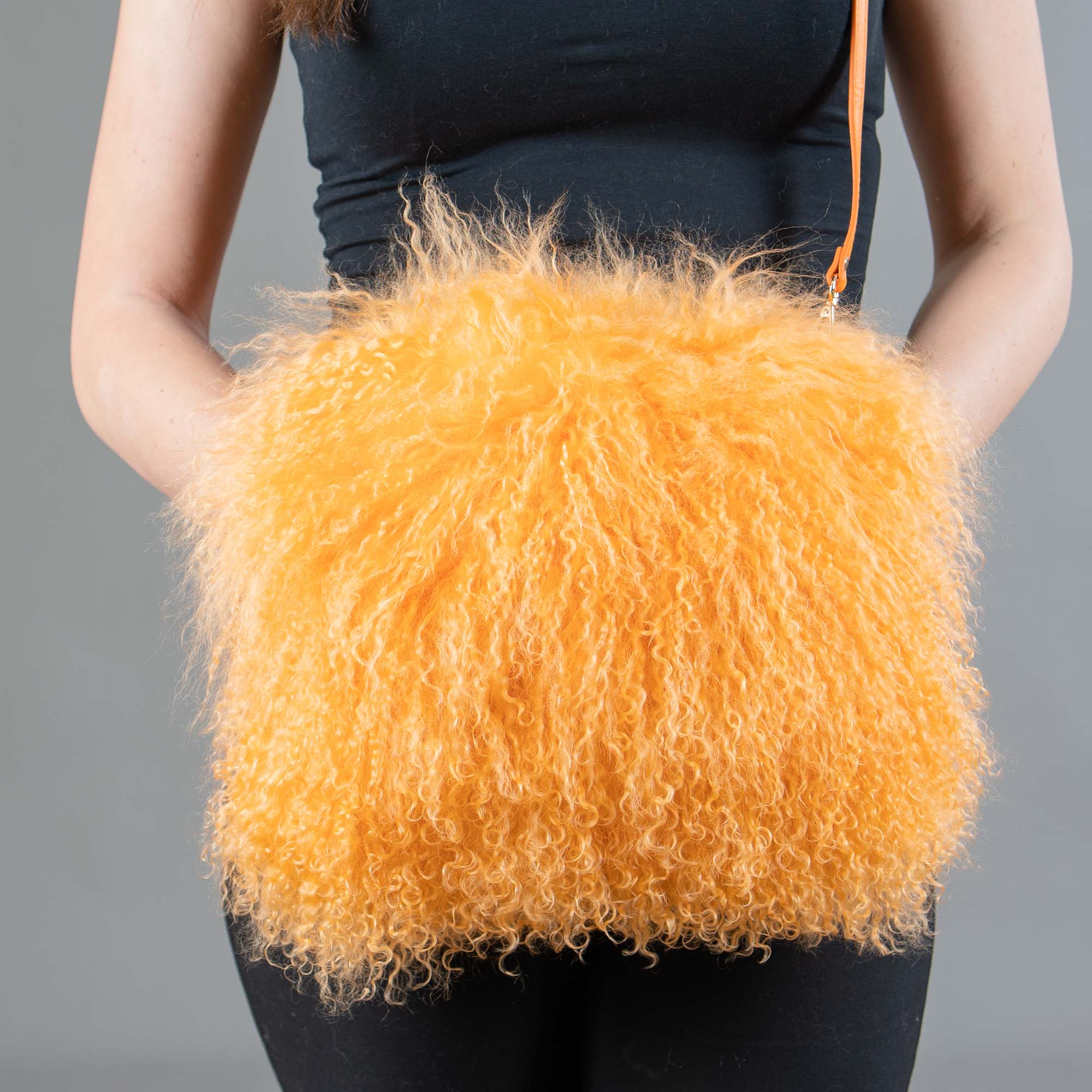 Orange Mongolian sheep fur bag and hand muff
