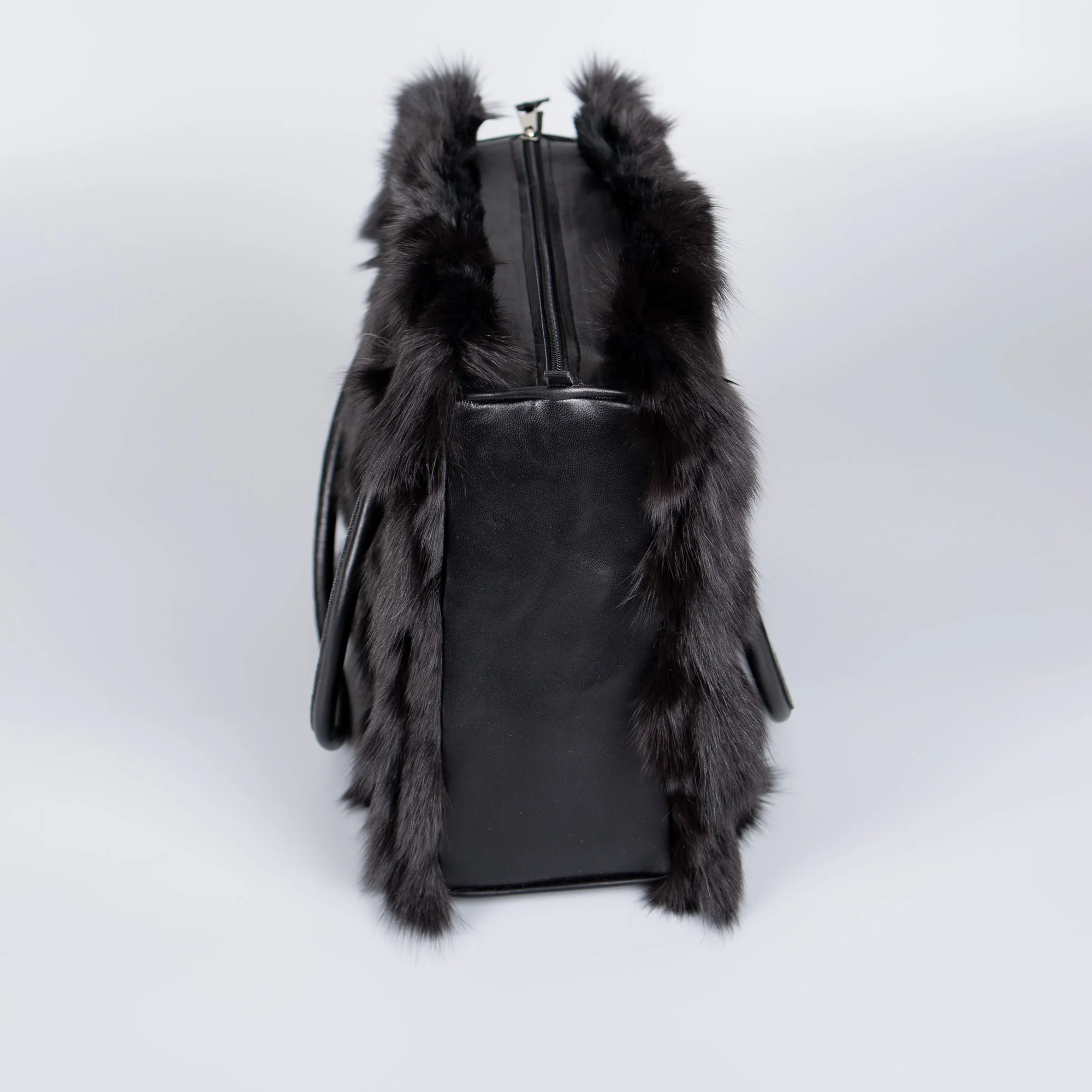 Fox fur handbag with leather details in black color | eFurs