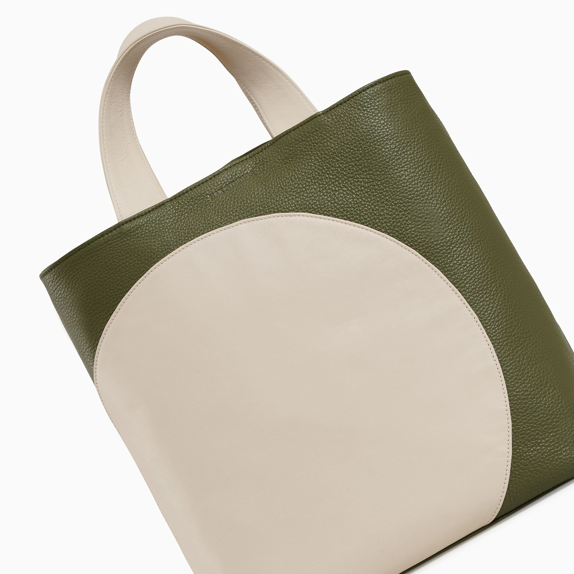 Leather handbag in beige-green color