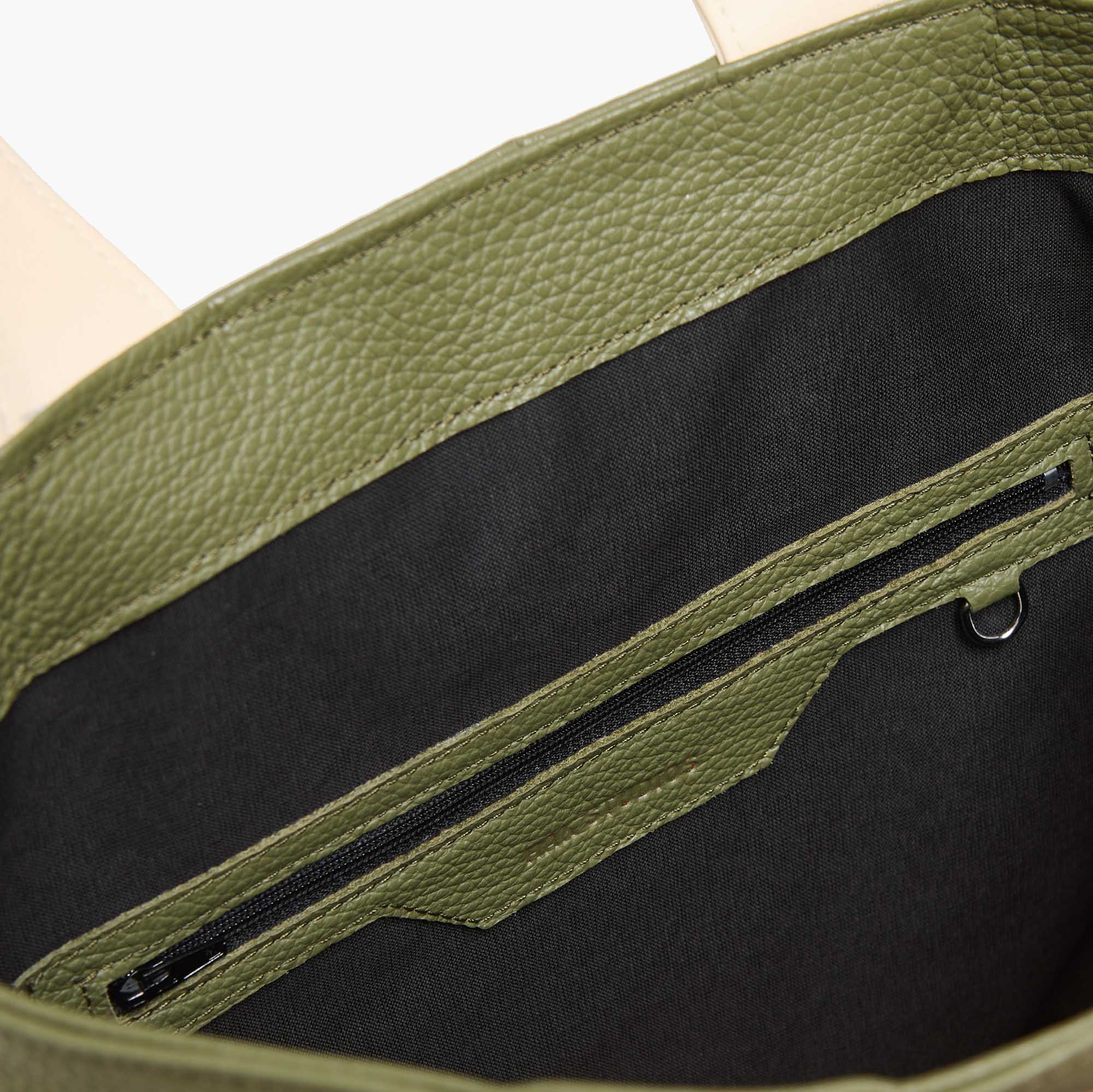 Leather handbag in beige-green color