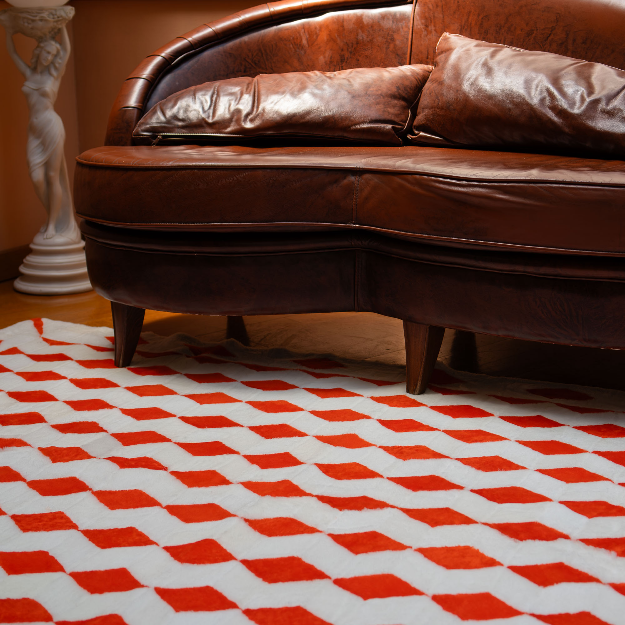 Red sheepskin fur carpet in a chess pattern