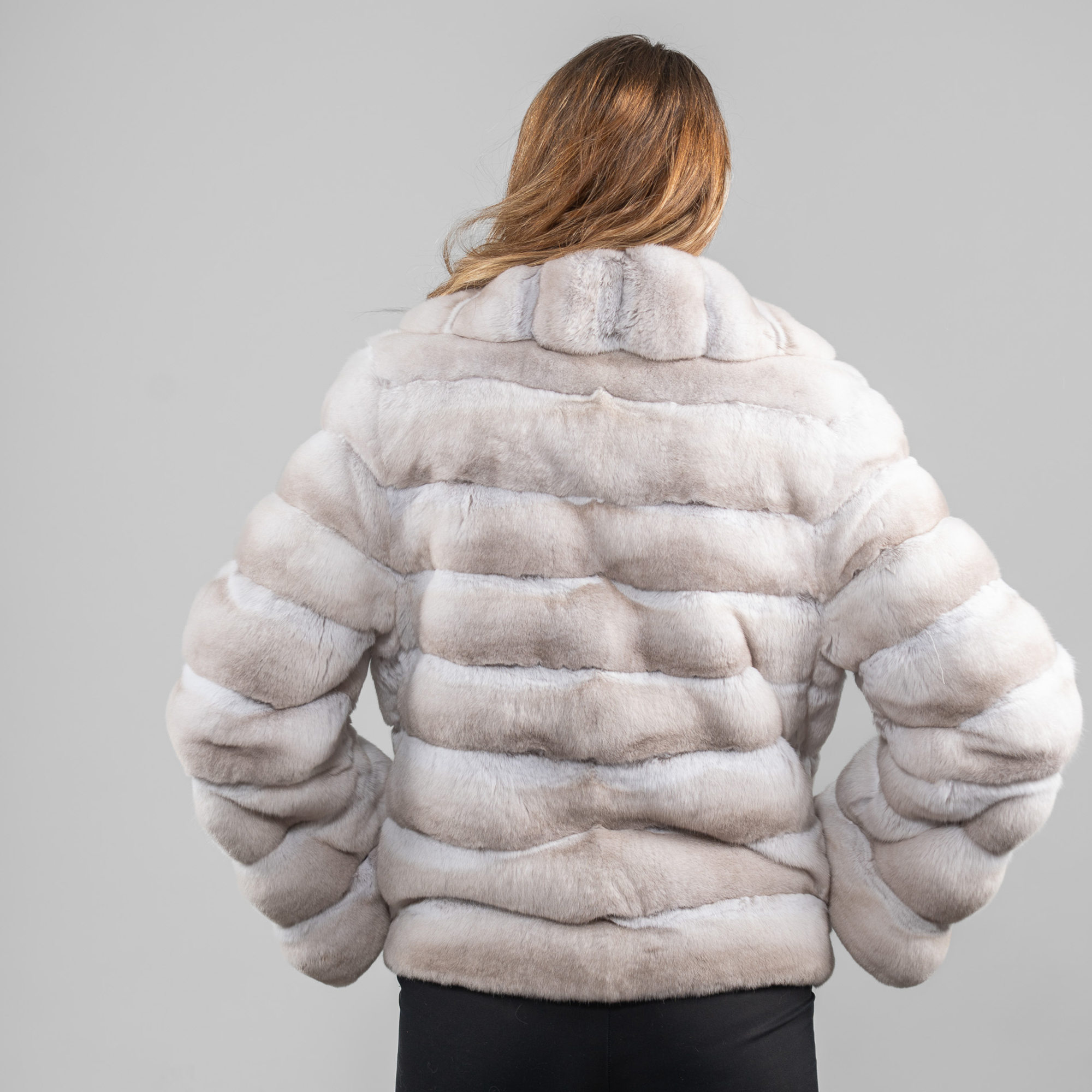 Beige chinchilla fur jacket with a wide collar