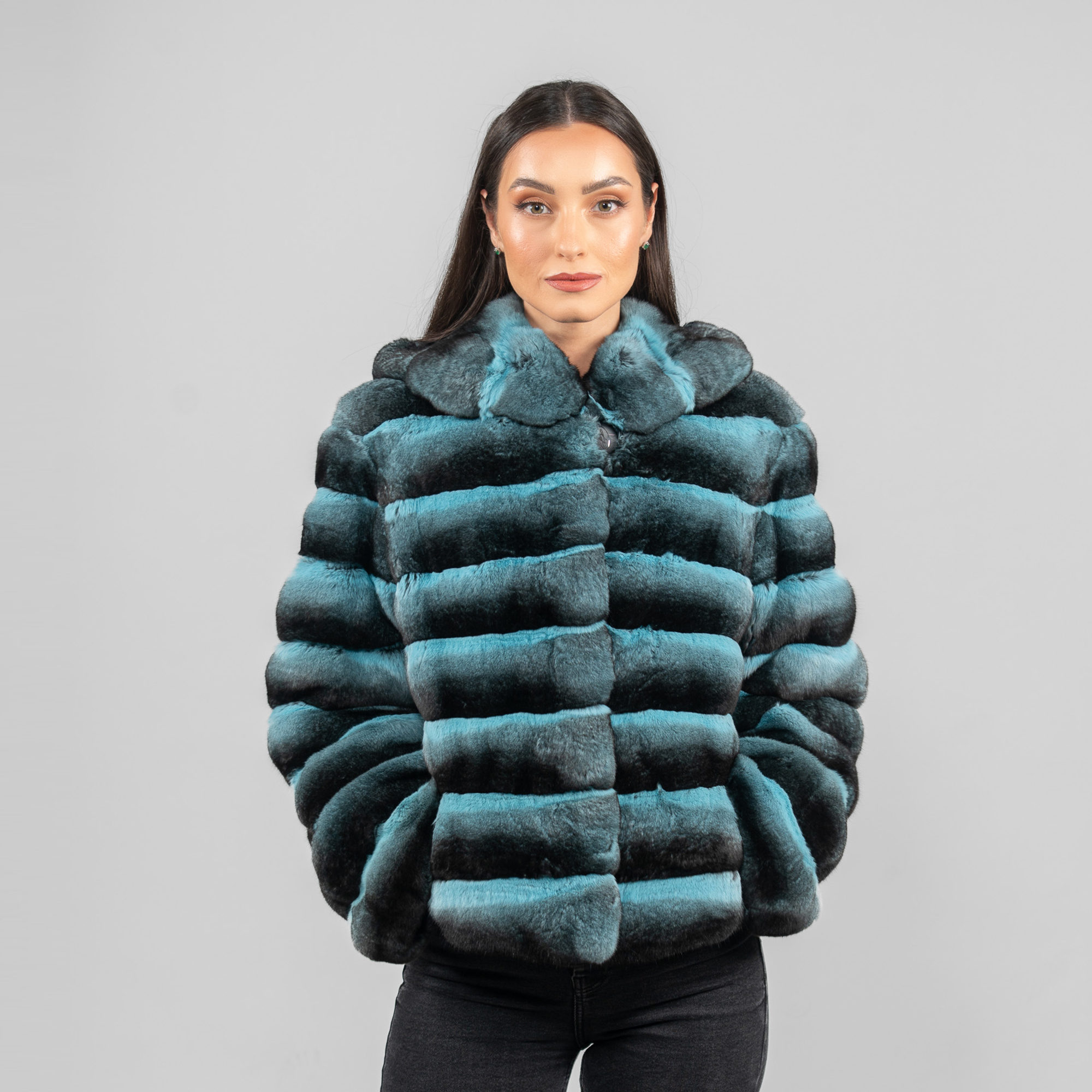 Hooded chinchilla fur jacket in a light blue color
