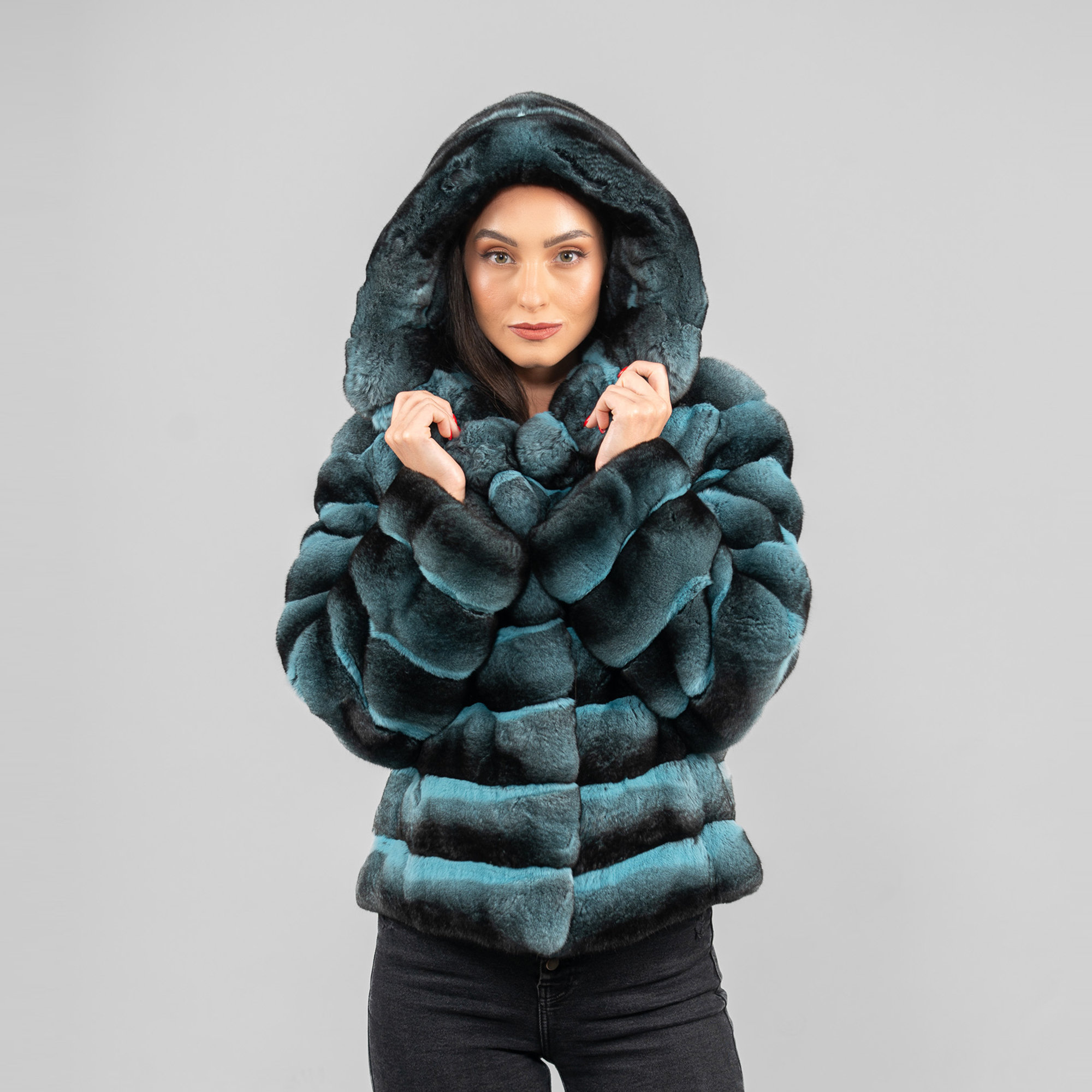 Hooded chinchilla fur jacket in a light blue color