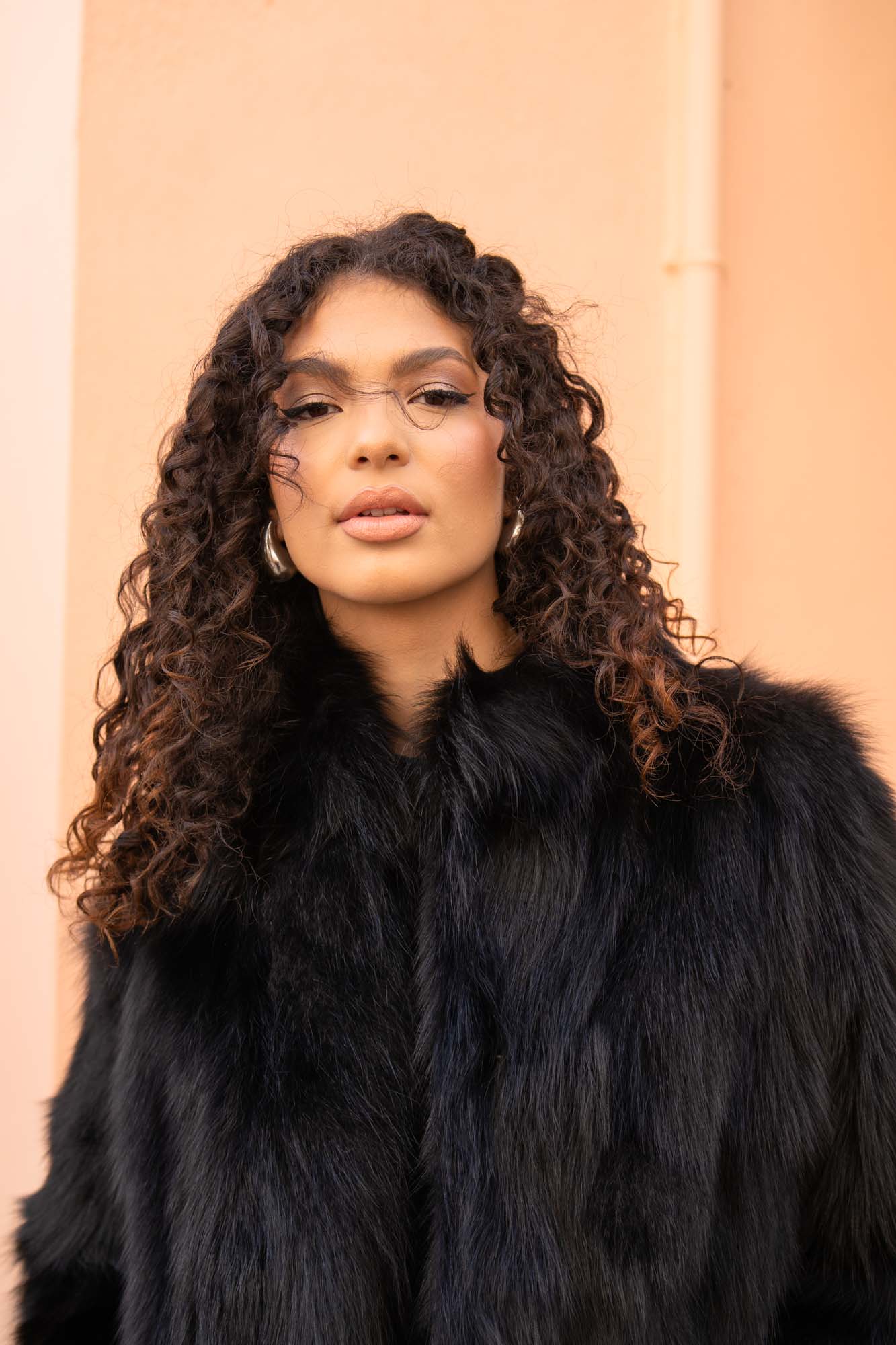 Fox fur jacket with a collar in black color