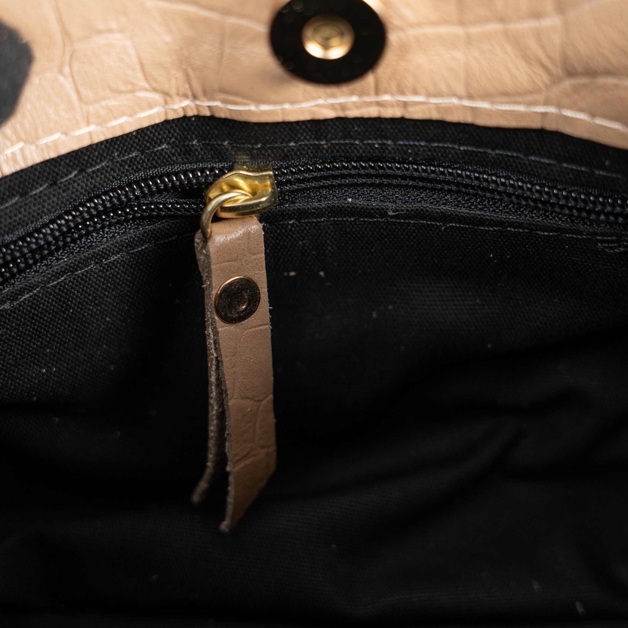 Beige leather handbag