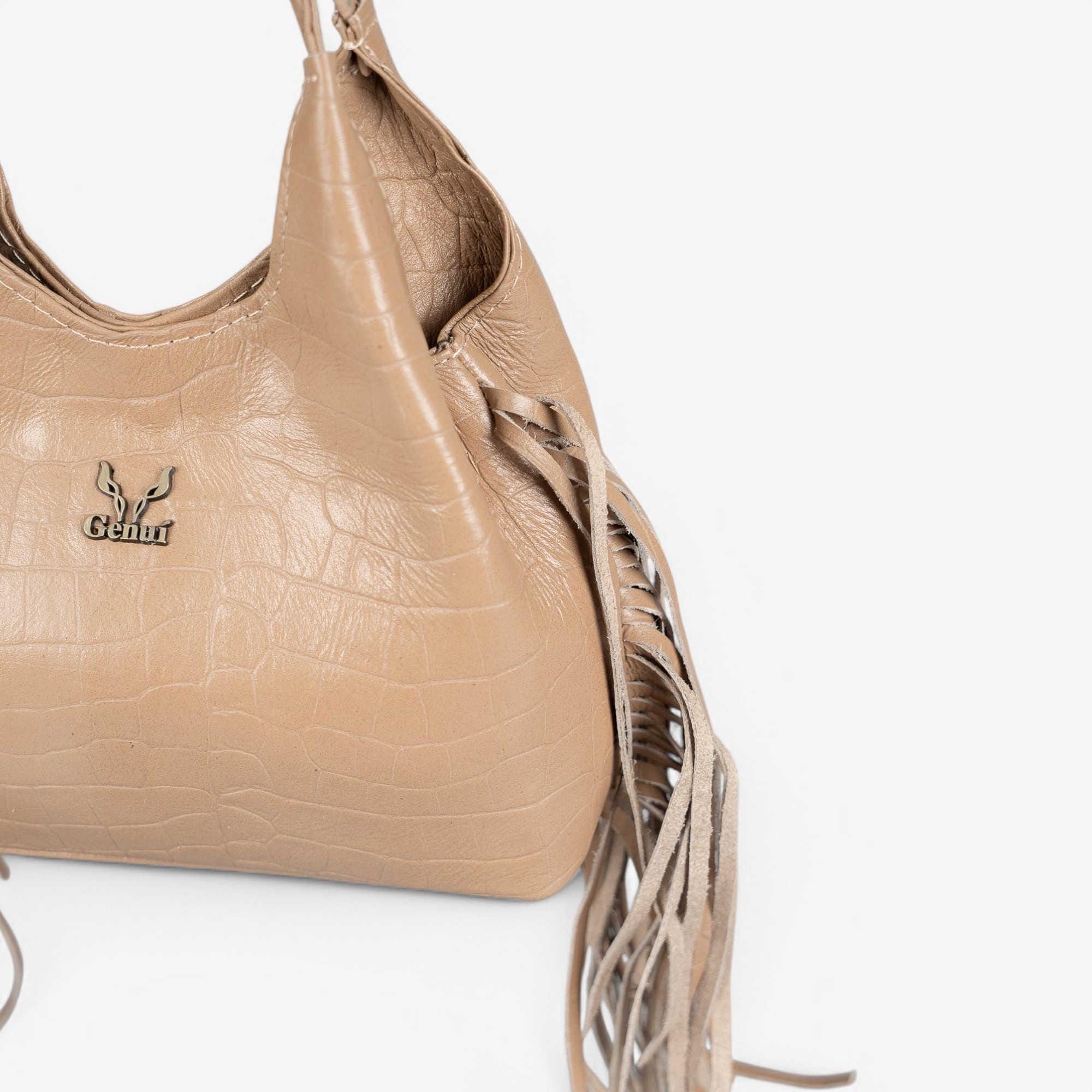 Beige leather handbag