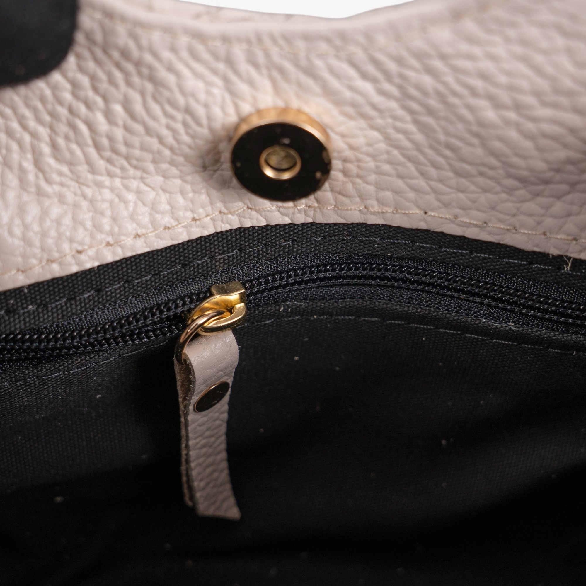 Beige leather handbag