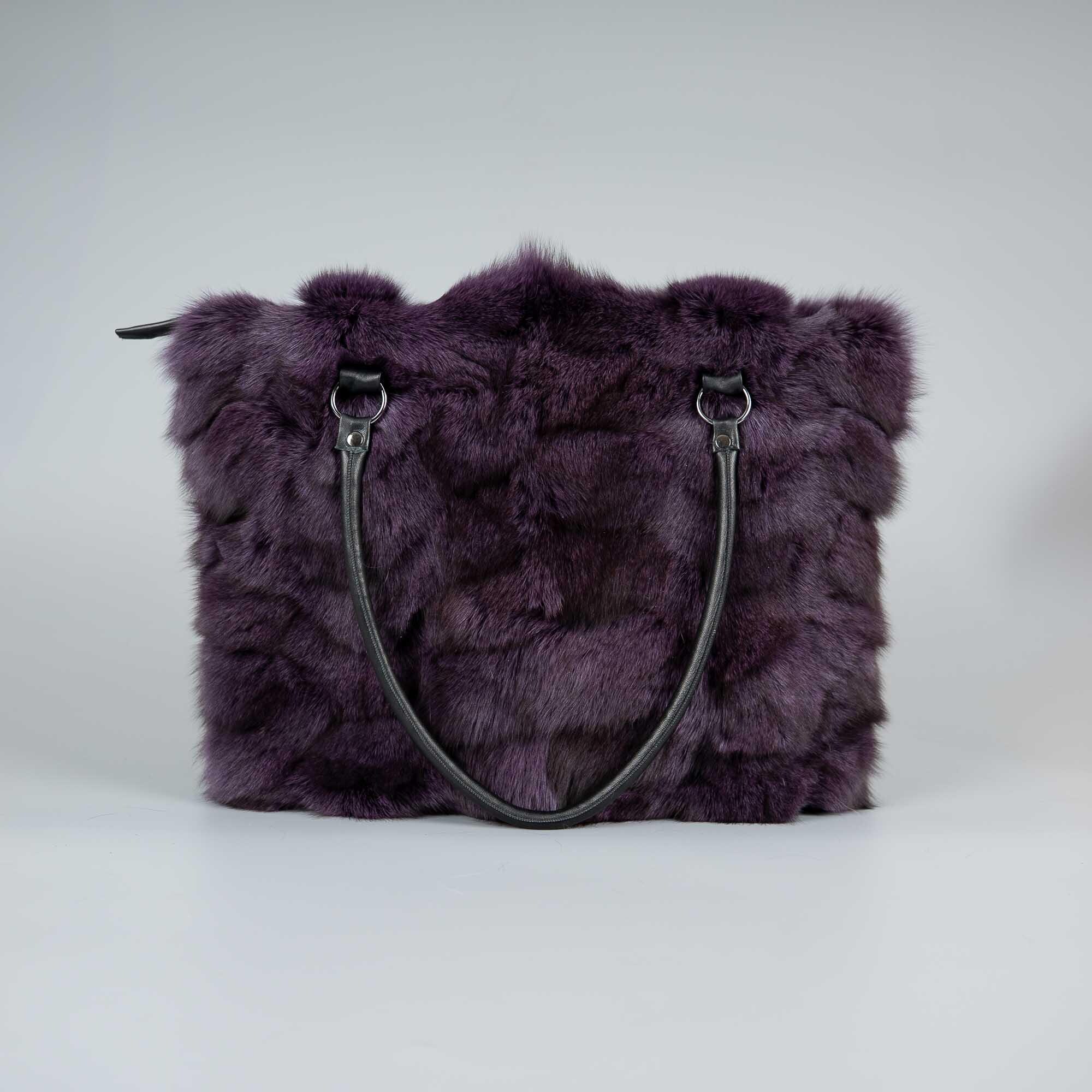 Handbag from fox fur in purple color